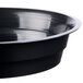 A black Fineline low profile plastic serving bowl with a white background.