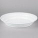 A white Fineline low profile plastic catering bowl.