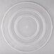 A clear plastic container lid with four circles.
