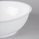 A white Fineline high profile plastic catering bowl.