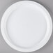 A white Fineline plastic catering tray with a high round rim.