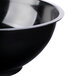 A close up of a black Fineline high profile plastic catering bowl.