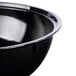A close up of a black Fineline high profile catering bowl with a black rim.