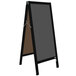 A black A-Frame sign with a black and brown chalk board.