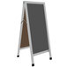 A slate gray chalk board with a white frame.