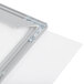 An Aarco aluminum slide frame with a white board in it.