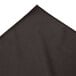 A charcoal Snap Drape table skirt with a bow tie pleat edge.
