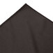 A black table skirt with a pleated edge.