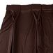 A brown Snap Drape table skirt with bow tie pleats.
