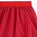 A red Snap Drape table skirt with shirred pleats.