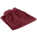 A folded red table skirt on a white background.
