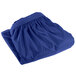 A royal blue shirred pleat table skirt on a white background.