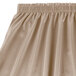 A beige Snap Drape table skirt with shirred pleats.
