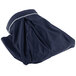 A navy blue table skirt bag with a white zipper.