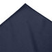 A navy blue table skirt with pleats on a white background.