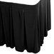 A black table skirt with pleats.