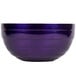 A close-up of a Vollrath Passion Purple double wall metal beehive bowl.