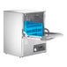 A Noble Warewashing undercounter dishwasher with blue trays inside.