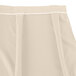 A white continuous pleat table skirt with a white band.