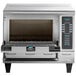 A silver TurboChef Tornado rapid cook oven with the door open.
