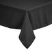 A black square Intedge tablecloth with a white hem on a table.