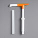 A white and orange Tablecraft maxi pelican pump tube with a handle.