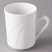 A Libbey white porcelain coffee mug with a curved handle.
