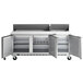 A Beverage-Air stainless steel refrigerated sandwich prep table with three doors.