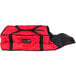 A red and black Rubbermaid insulated pizza delivery bag with a zipper.