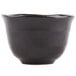 A black Libbey stoneware sake cup with a small handle.