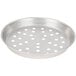 A silver round metal pan with holes.