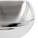 A Vollrath stainless steel square serving bowl with a beehive design.
