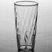 A clear plastic Carlisle tumbler with a curved design.