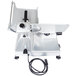 A silver Globe G12 meat slicer with a black cord.