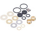 A white circle with a group of different sizes of metal and plastic washers and seals.