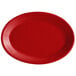 A red oval platter with a thin white rim.