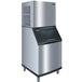 A stainless steel Manitowoc QuietQube remote condenser ice machine with a black top.