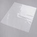 An ARY VacMaster 4 mil clear plastic bag on a white surface.