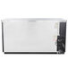 A Beverage-Air black counter height back bar refrigerator with white doors and black trim.