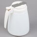 A Tablecraft white polyethylene jug with a lid and a handle.