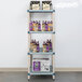 A MetroMax Q shelf with beer bottles and boxes on it.