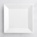 An Acopa bright white square porcelain plate on a table.