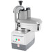 A Robot Coupe CL40 continuous feed food processor with a lid on it.
