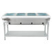 An Eagle Group open well stainless steel hot food table with four trays.