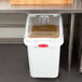 A white plastic Rubbermaid ingredient storage bin with a clear lid.