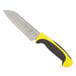 A Mercer Culinary Millennia Colors yellow and black Santoku knife with a yellow handle.
