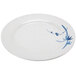 A white plate with a blue bamboo design.