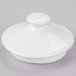A white CAC porcelain tea pot lid with a small knob.