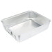 A silver rectangular Vollrath aluminum roaster pan with handles on a counter.