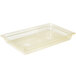 A Cambro amber plastic food pan on a counter.